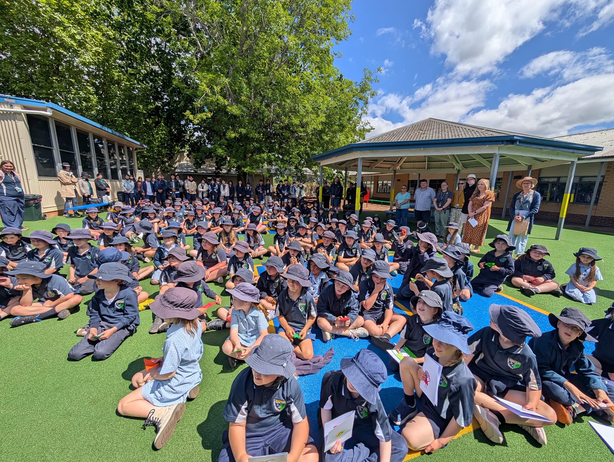 students assembled on lawns